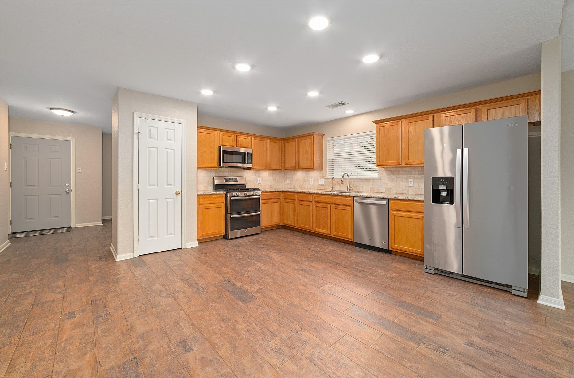 14610 Hazy Ridge Lane Cypress, TX 77429 - Photo 14 of 38 Side by side Whirlpool fridge stays