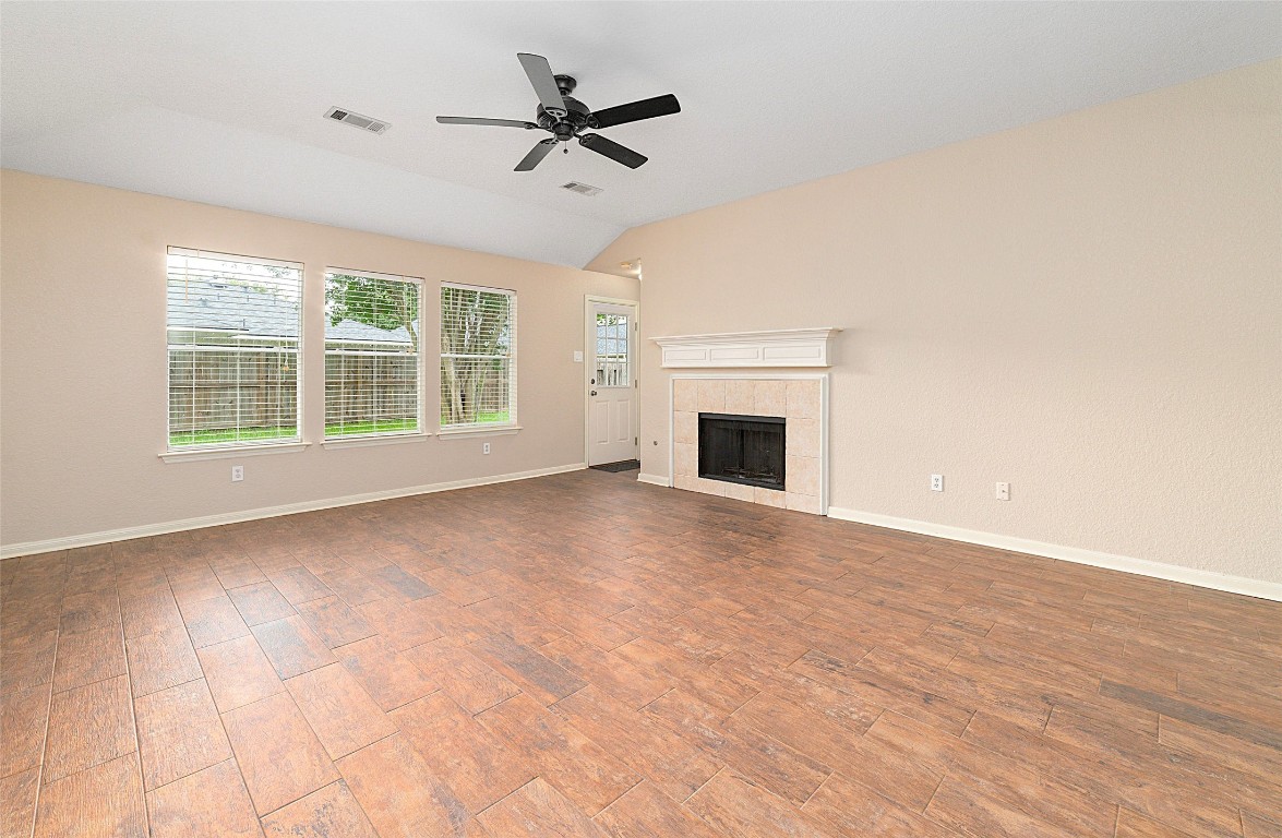 14610 Hazy Ridge Lane Cypress, TX 77429 - Photo 17 of 38 Fireplace for cozy gatherings