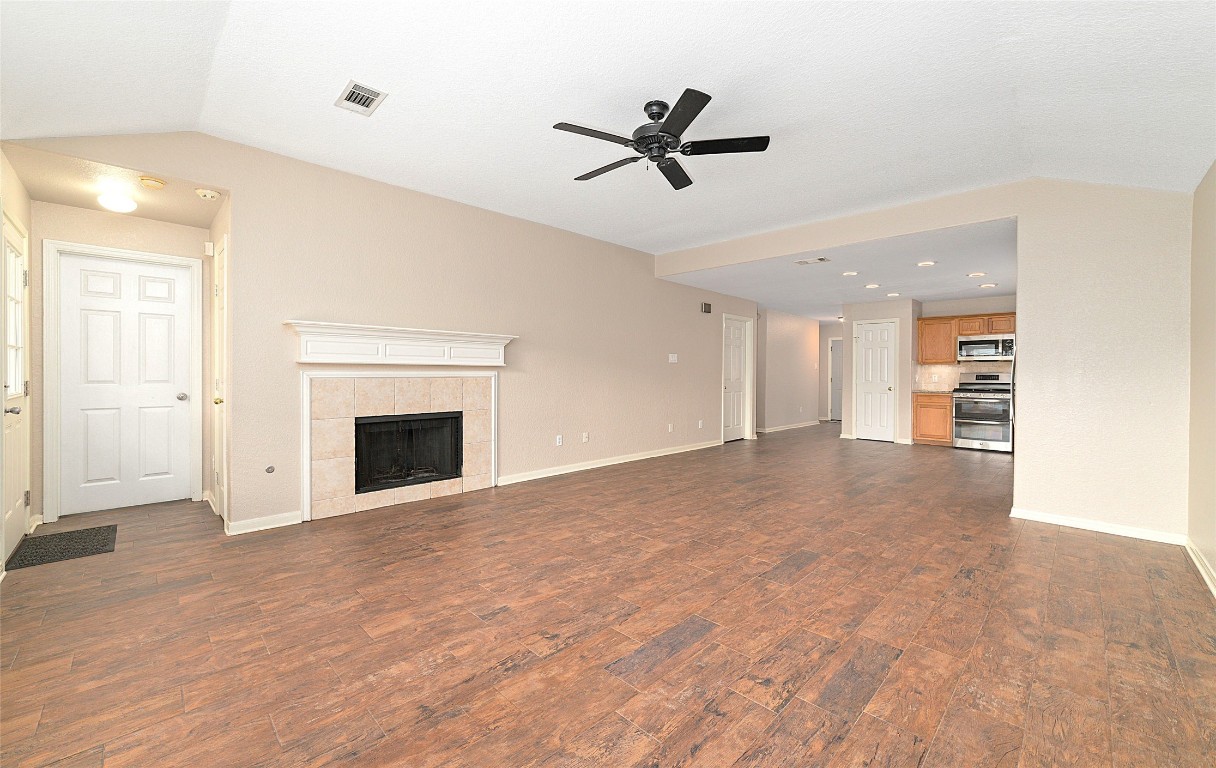 14610 Hazy Ridge Lane Cypress, TX 77429 - Photo 18 of 38 Spacious living area with gas starter fireplace