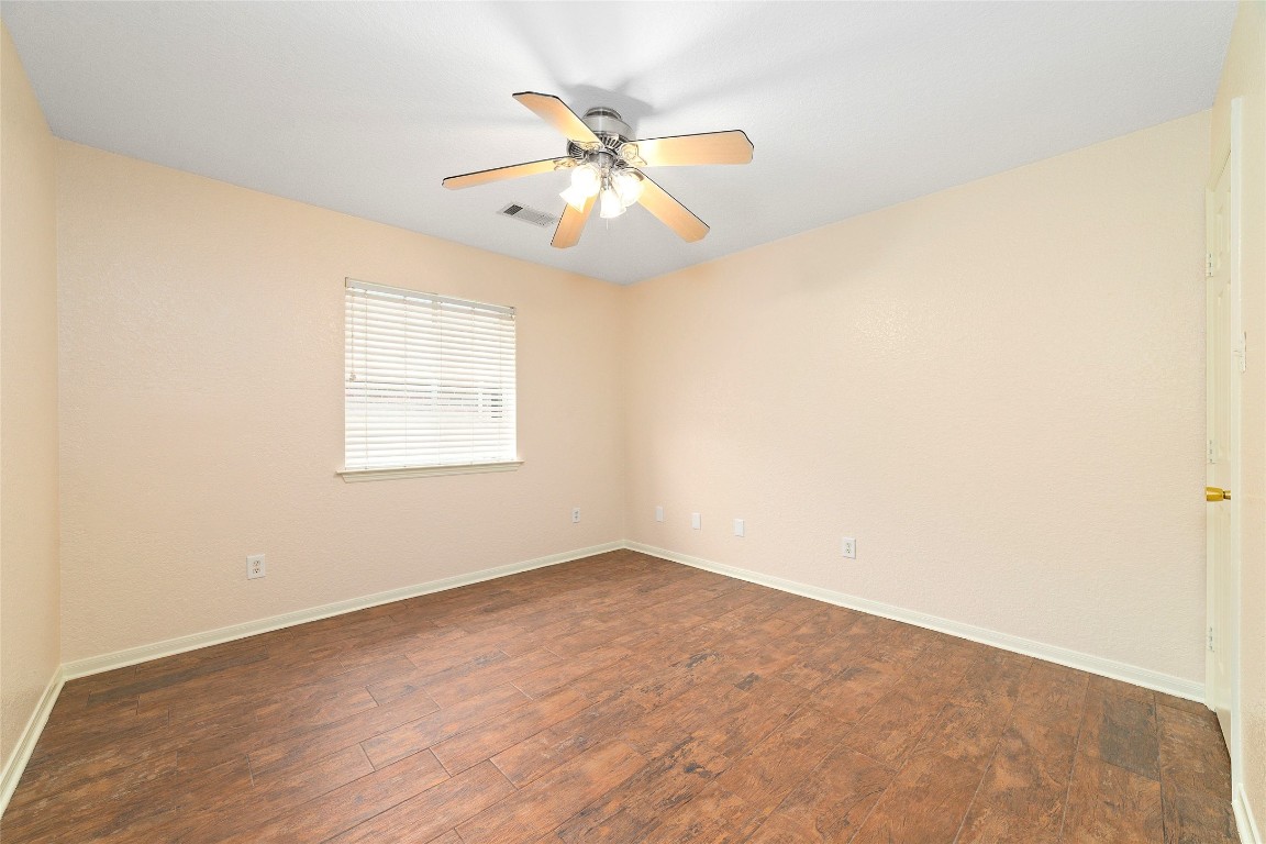 14610 Hazy Ridge Lane Cypress, TX 77429 - Photo 26 of 38 BR #2; Tile flooring, large walk-in closet