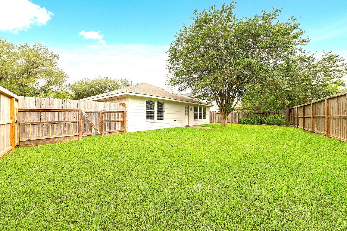 14610 Hazy Ridge Lane Cypress, TX 77429 - Photo 5 of 38 Large yard for children to play! (or pets)