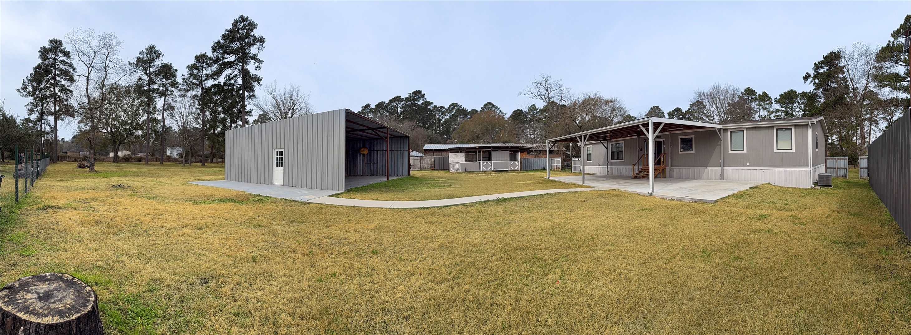 19007 Turtle Creek Way Magnolia, TX 77355 - Photo 20 of 34 a view of a house with a yard and sitting area