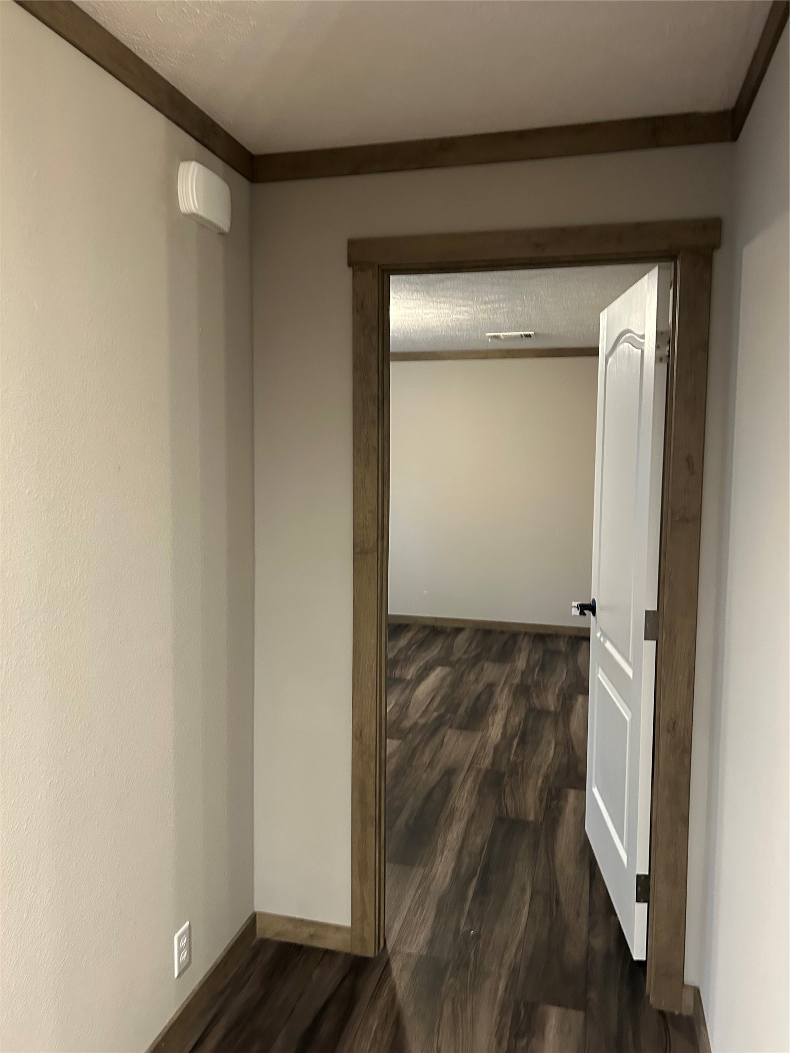 19007 Turtle Creek Way Magnolia, TX 77355 - Photo 25 of 34 a view of a hallway to an empty room and wooden floor