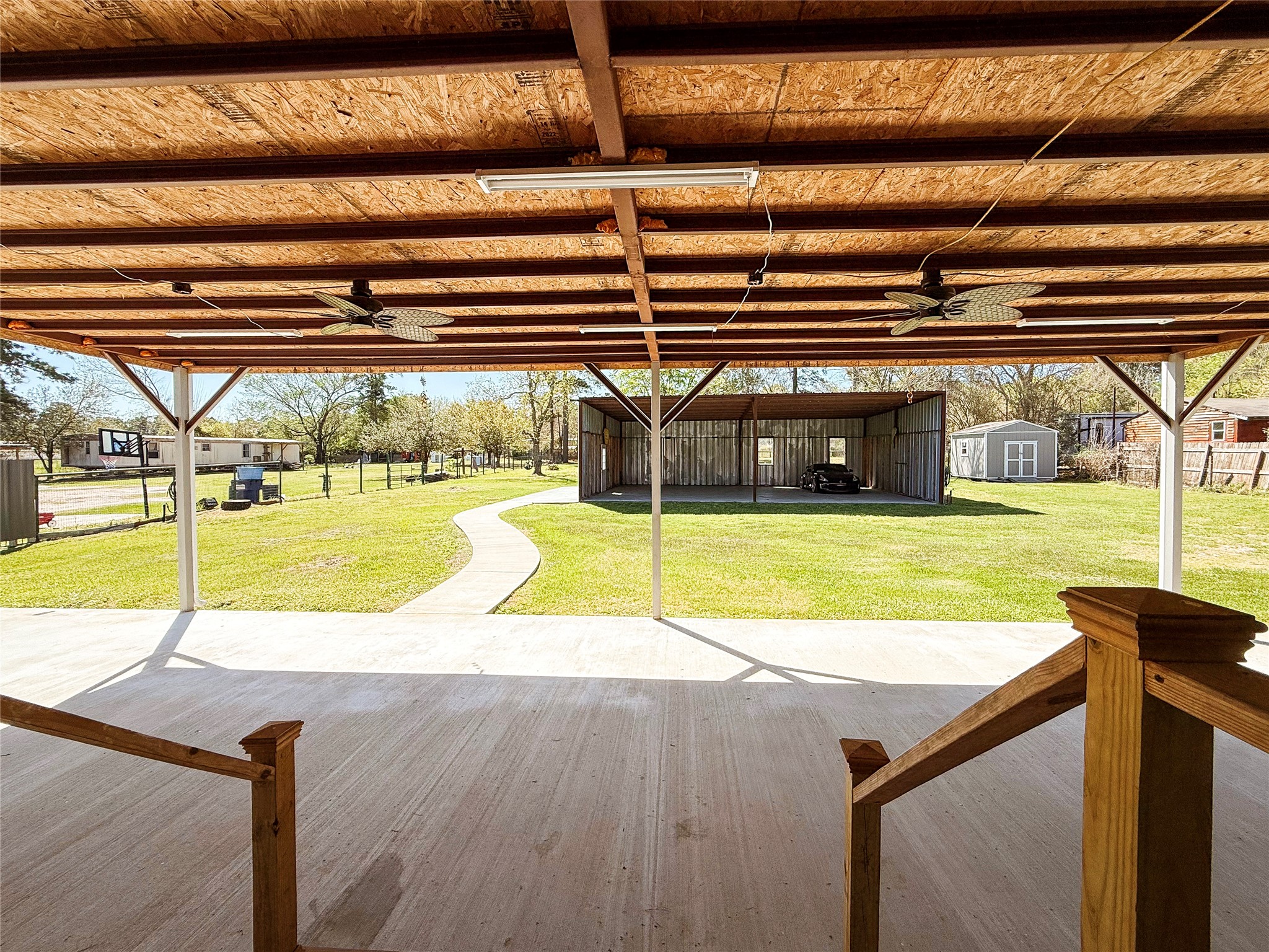 19007 Turtle Creek Way Magnolia, TX 77355 - Photo 34 of 34 a view of a swimming pool with a yard