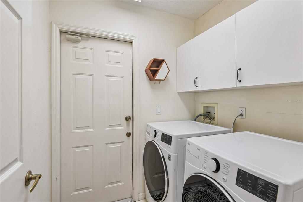 1129 Daleside Lane New Port Richey, FL 34655 - Photo 24 of 34 a utility room with dryer and washer