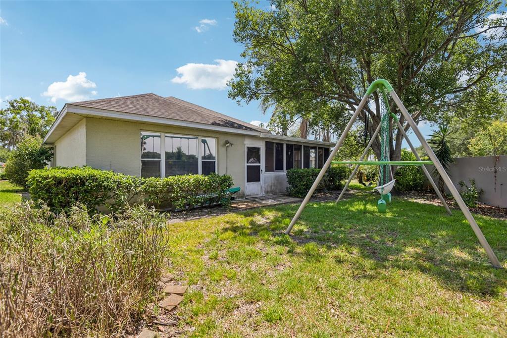 1129 Daleside Lane New Port Richey, FL 34655 - Photo 28 of 34 a view of a house with a yard