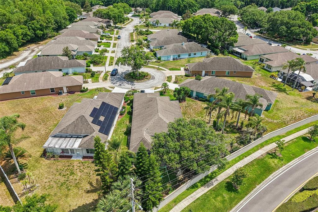 1129 Daleside Lane New Port Richey, FL 34655 - Photo 32 of 34 an aerial view of residential houses with outdoor space