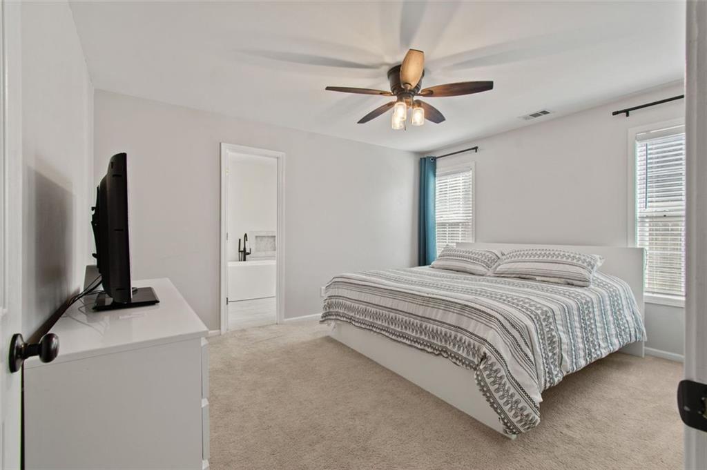 2907 Albright Commons Kennesaw, GA 30144 - Photo 23 of 35 a bedroom with a bed and a window