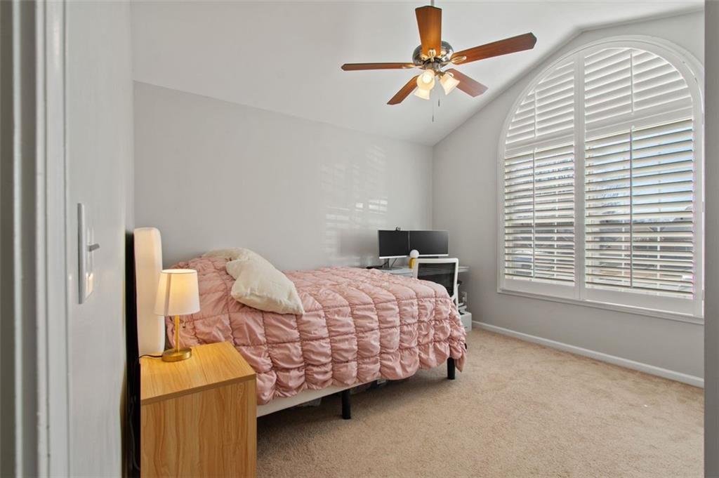 2907 Albright Commons Kennesaw, GA 30144 - Photo 28 of 35 a bedroom with a bed next to a window