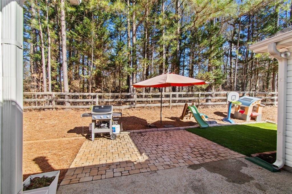 2907 Albright Commons Kennesaw, GA 30144 - Photo 29 of 35 a view of a swimming pool with a patio