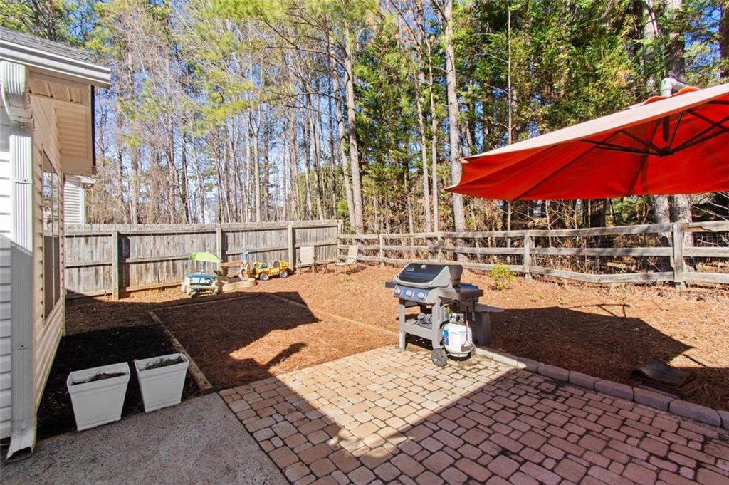2907 Albright Commons Kennesaw, GA 30144 - Photo 31 of 35 a view of outdoor space yard deck patio and outdoor kitchen