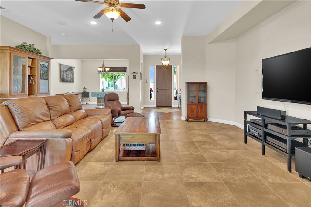 654 Red Cloud Road Paso Robles, CA 93446 - Photo 12 of 46 a living room with furniture and a flat screen tv