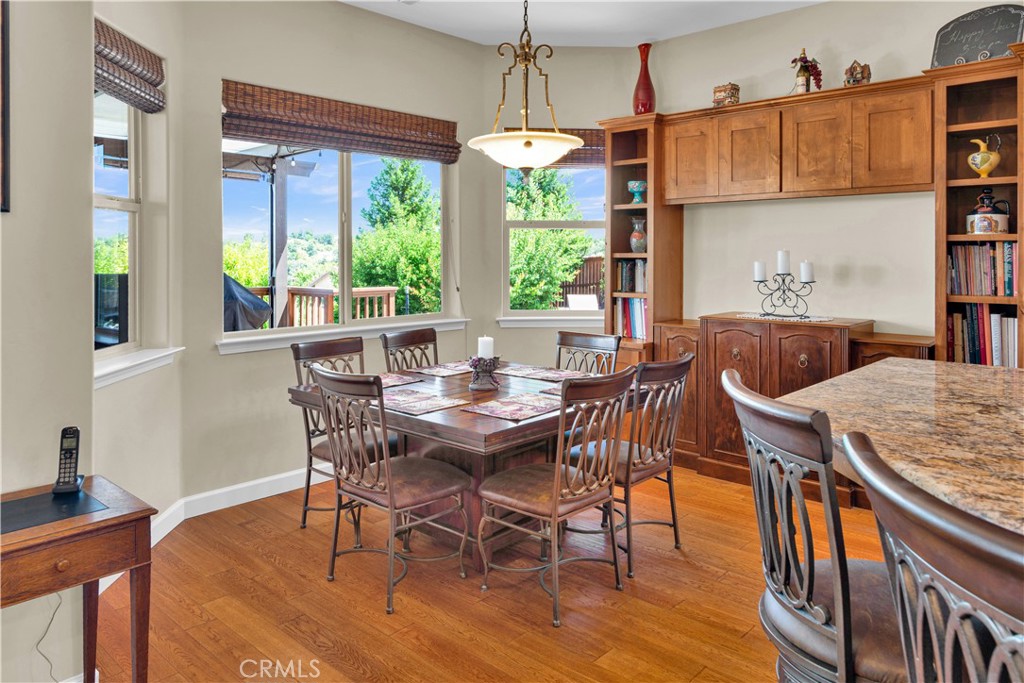 654 Red Cloud Road Paso Robles, CA 93446 - Photo 19 of 46 a view of a dining room with furniture window and outside view