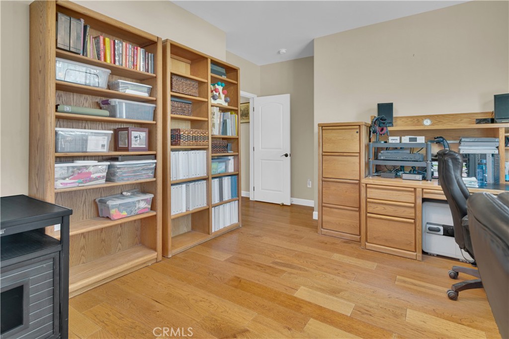 654 Red Cloud Road Paso Robles, CA 93446 - Photo 34 of 46 a view of a kitchen with furniture and a book shelf