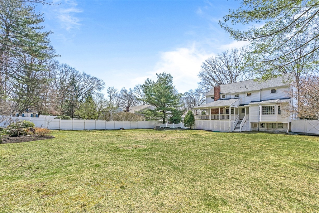 24 Cider Mill Road Framingham, MA 01701 - Photo 18 of 19 a view of a house with a yard