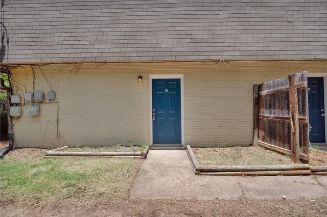 a view of a backyard of the house
