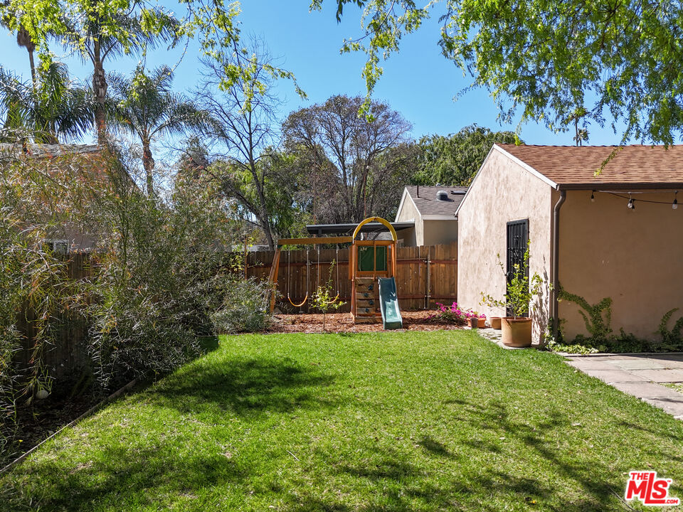 592 Figueroa Drive Altadena, CA 91001 - Photo 17 of 19 a view of a house with backyard and a tree