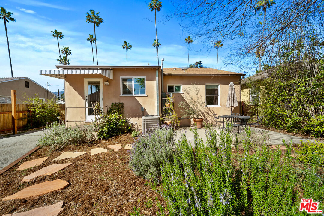 592 Figueroa Drive Altadena, CA 91001 - Photo 18 of 19 a front view of a house with garden