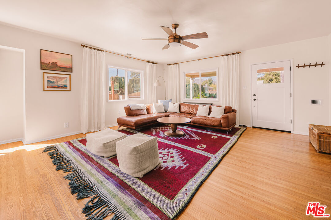 592 Figueroa Drive Altadena, CA 91001 - Photo 3 of 19 a living room with a couch and a table