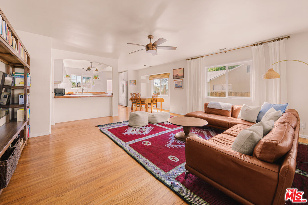 592 Figueroa Drive Altadena, CA 91001 - Photo 4 of 19 a living room with furniture and wooden floor