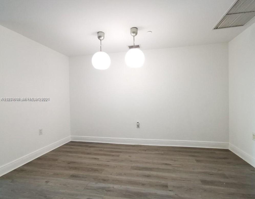 1250 South Miami Avenue, Unit 2104 Miami, FL 33130 - Photo 3 of 18 a view of a room with wooden floor