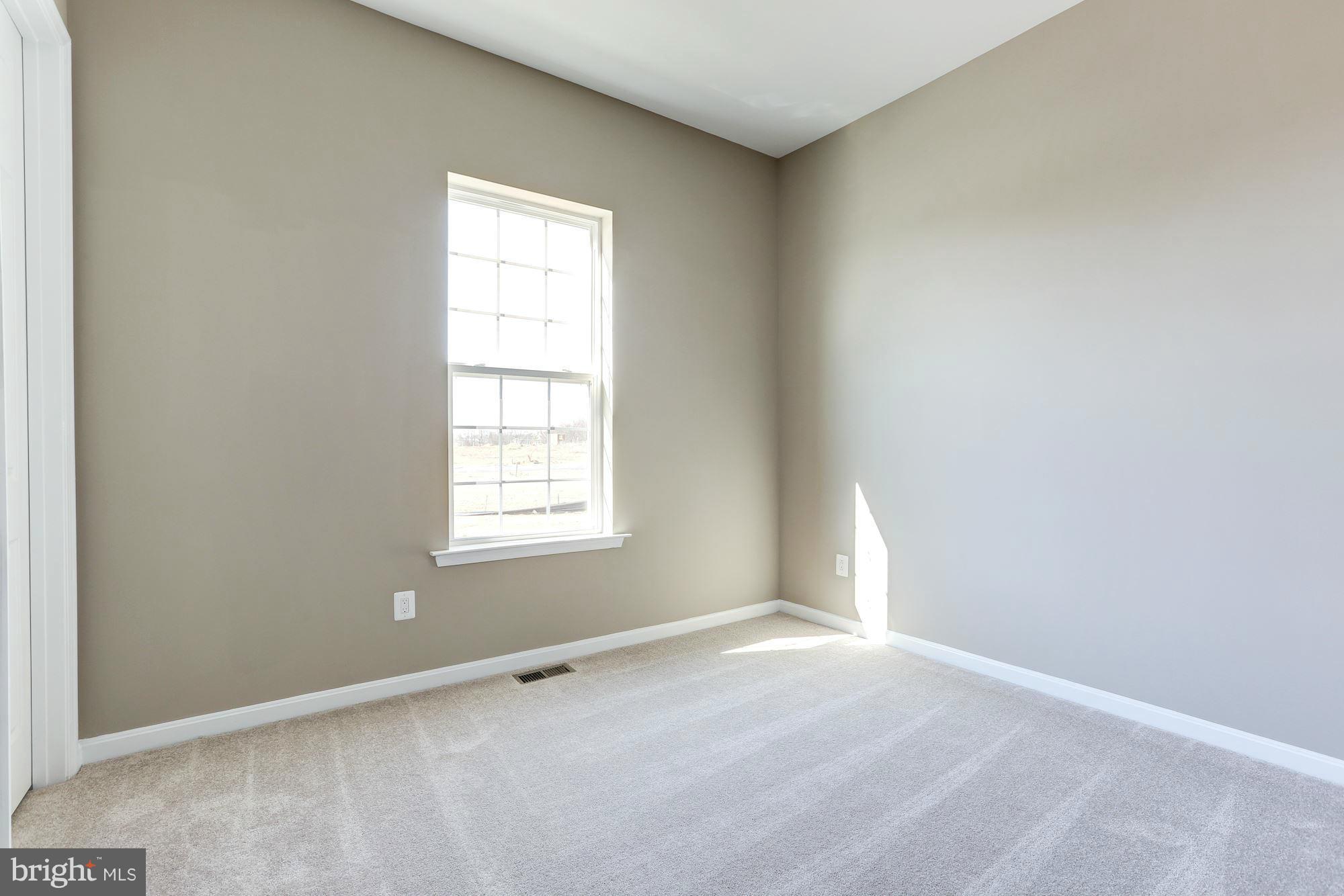 925 Lindley Road Frederick, MD 21701 - Photo 27 of 30 an empty room with a window