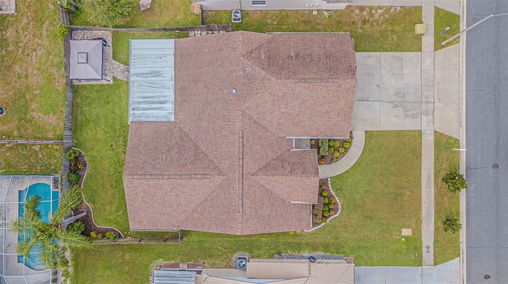 9809 La Rita Place Riverview, FL 33569 - Photo 57 of 59 an aerial view of a house with a yard