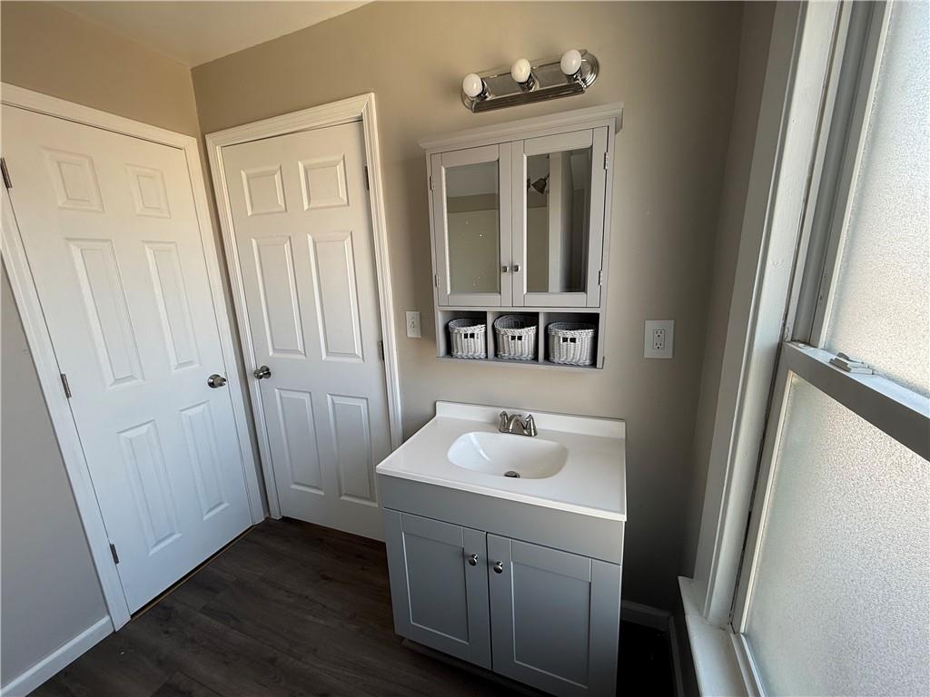 1056 Adams Street New Castle, PA 16101 - Photo 9 of 10 a bathroom with a sink and a mirror