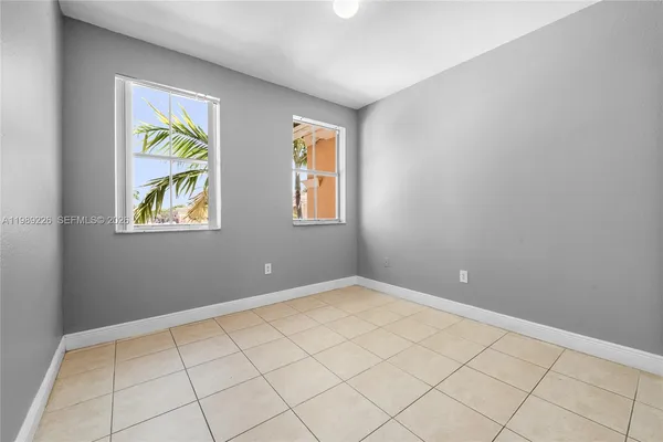 a view of an empty room and window