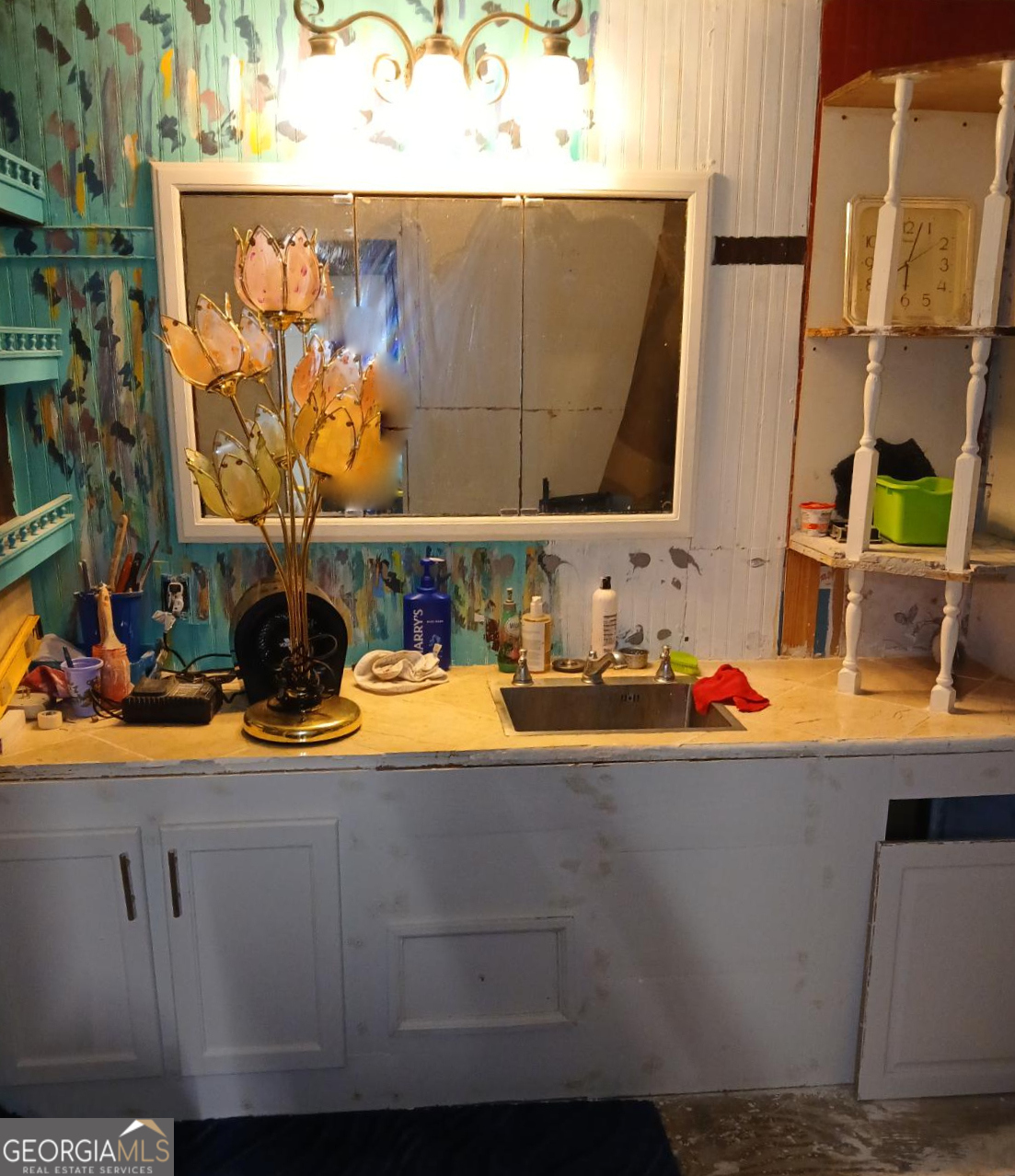 309 Sunset Lane Cairo, GA 39828 - Photo 5 of 6 a room with storage and utility