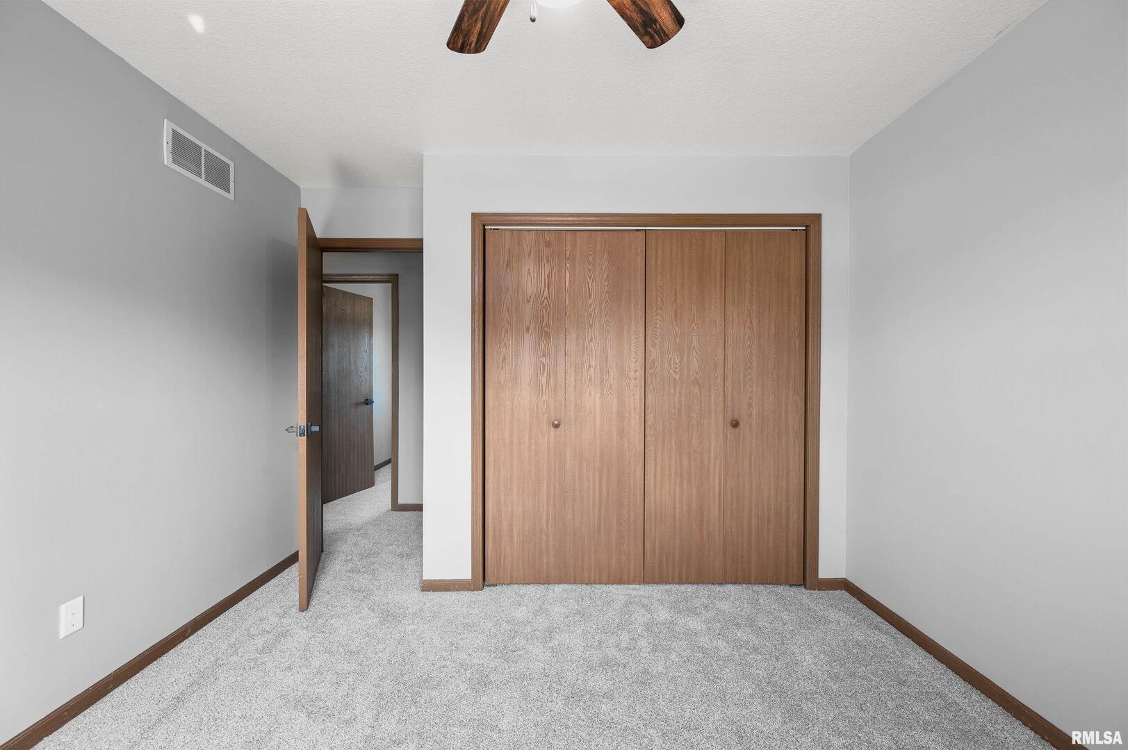 916 Ash Drive Colona, IL 61241 - Photo 18 of 38 a view of an empty room