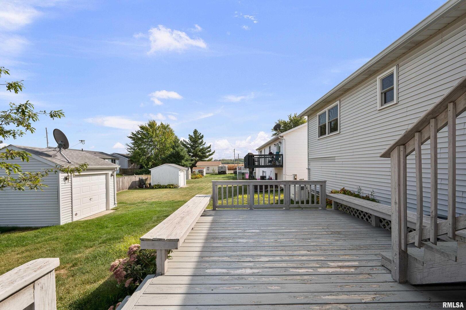 916 Ash Drive Colona, IL 61241 - Photo 33 of 38 a balcony with view of the house