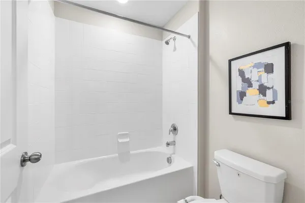 an aerial view of a house with a ocean view