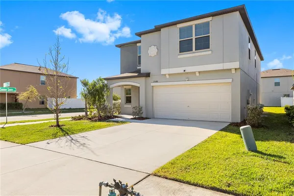 a view of swimming pool with a yard