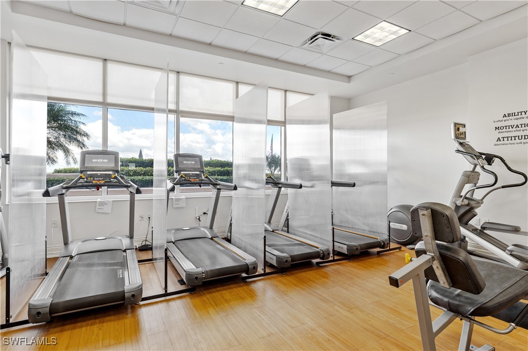 2090 West First Street, Unit I2409 Fort Myers, FL 33901 - Photo 33 of 50 a room with gym equipment and a large window