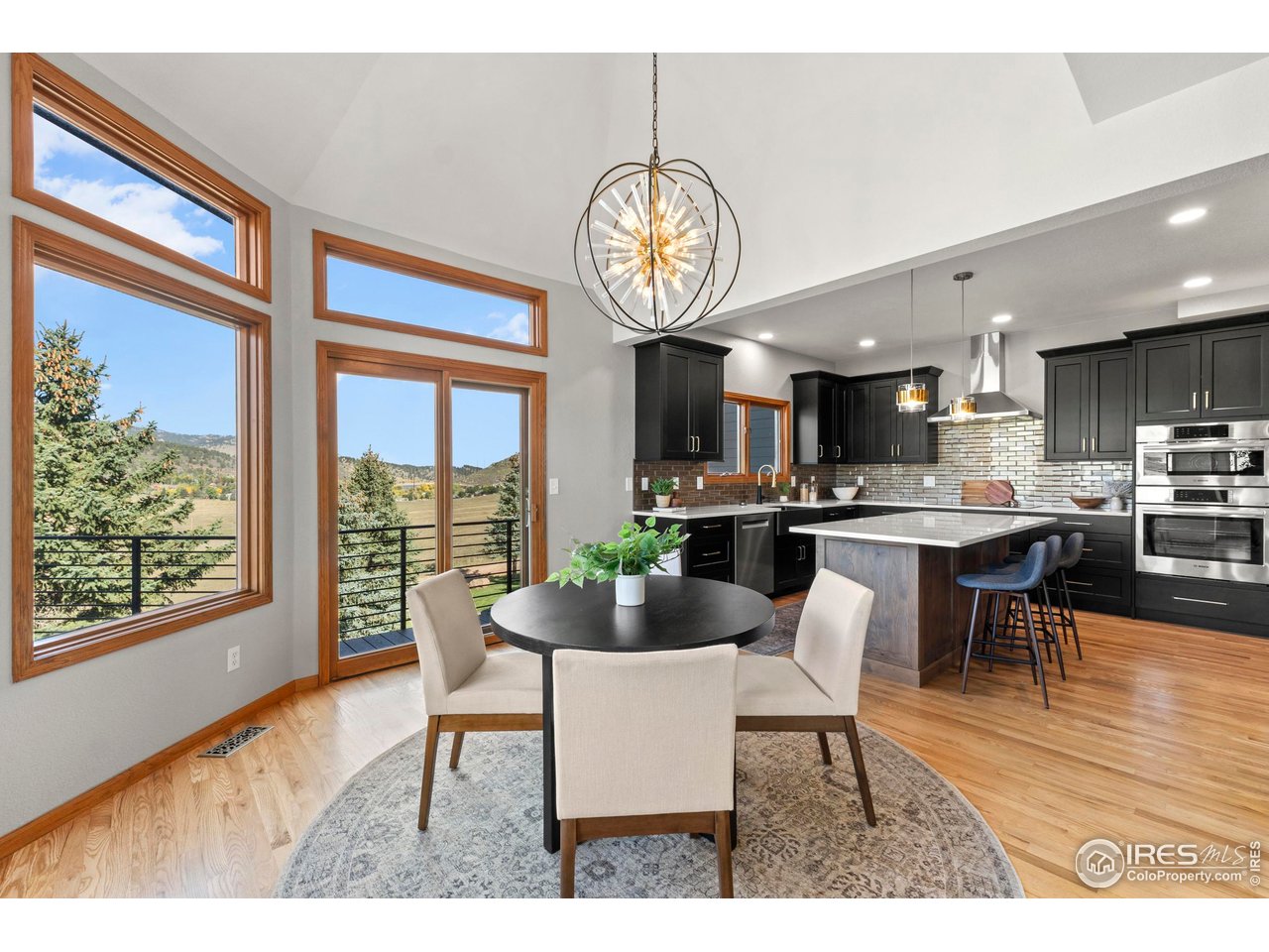 6534 Gindler Ranch Road Fort Collins, CO 80526 - Photo 16 of 48 Informal Dining With Deck Access