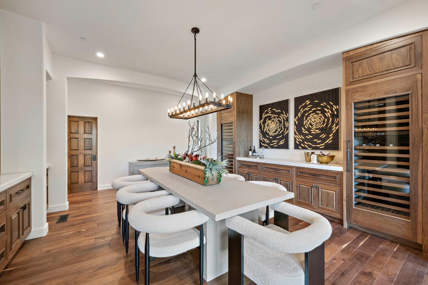15269 Bohlman Road Saratoga, CA 95070 - Photo 15 of 68 a view of a dining room with furniture wooden floor and chandelier