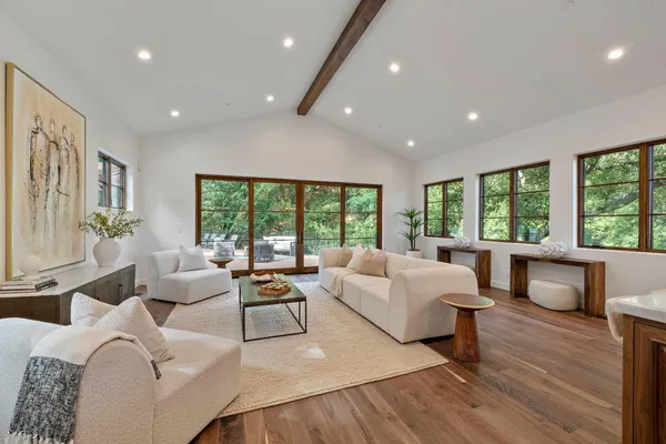 a view of a dining room with furniture window and outside view