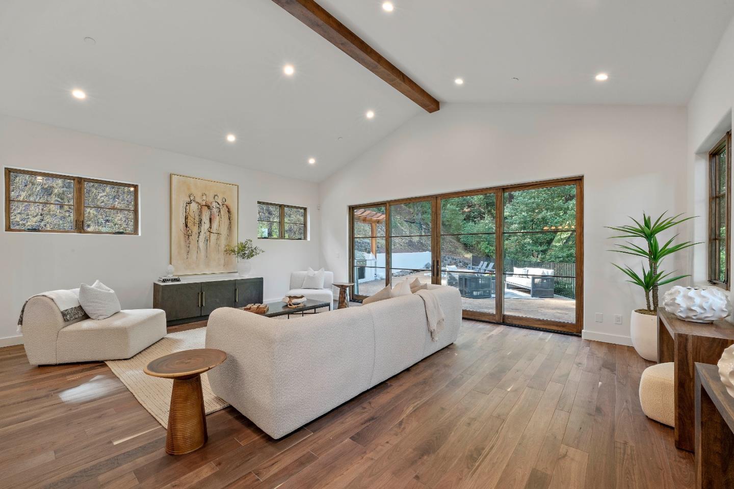 15269 Bohlman Road Saratoga, CA 95070 - Photo 25 of 68 a living room with furniture and a large window