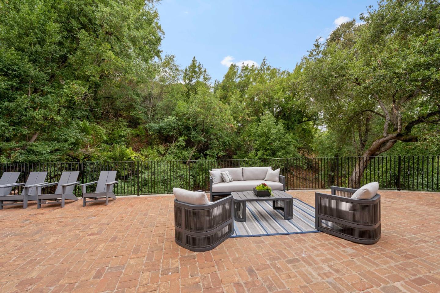 15269 Bohlman Road Saratoga, CA 95070 - Photo 29 of 68 a view of a patio with table and chairs and couches