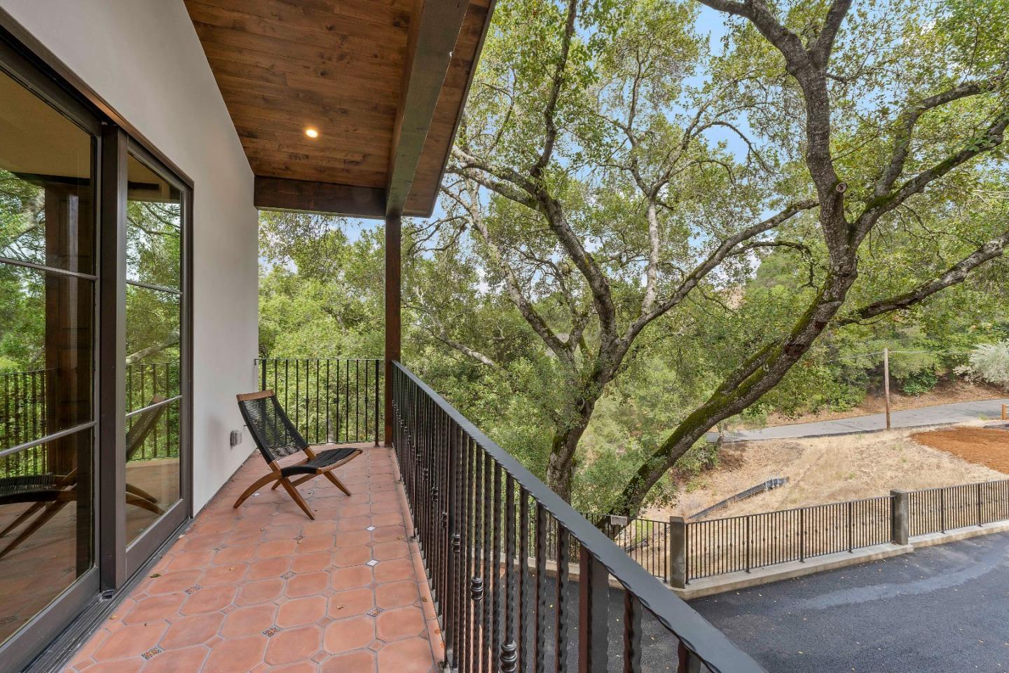 15269 Bohlman Road Saratoga, CA 95070 - Photo 35 of 68 a view of a balcony with chairs