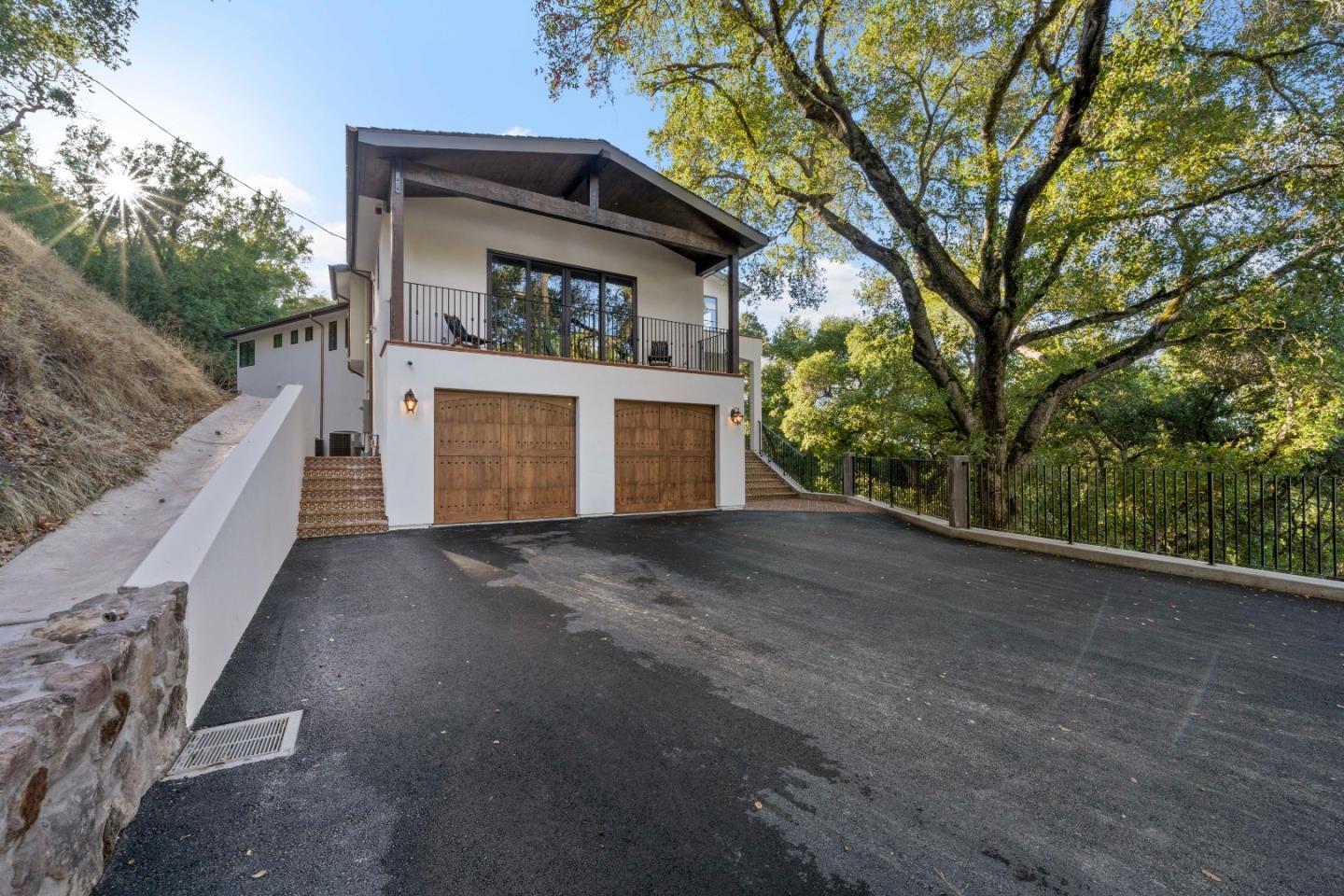 15269 Bohlman Road Saratoga, CA 95070 - Photo 4 of 68 a view of a house with a outdoor space