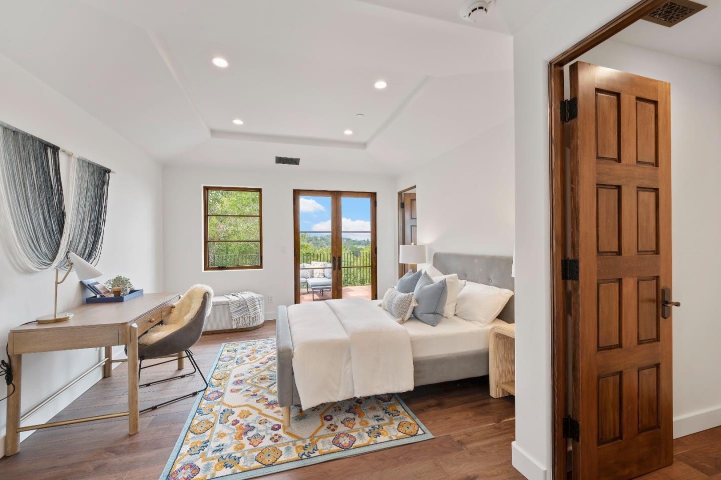 15269 Bohlman Road Saratoga, CA 95070 - Photo 46 of 68 a bedroom with furniture and a window