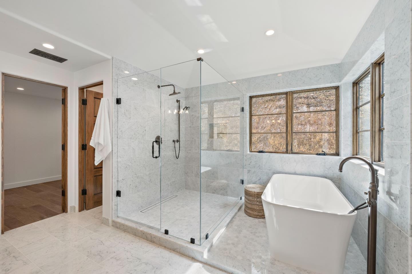 15269 Bohlman Road Saratoga, CA 95070 - Photo 53 of 68 a bathroom with a shower and a sink