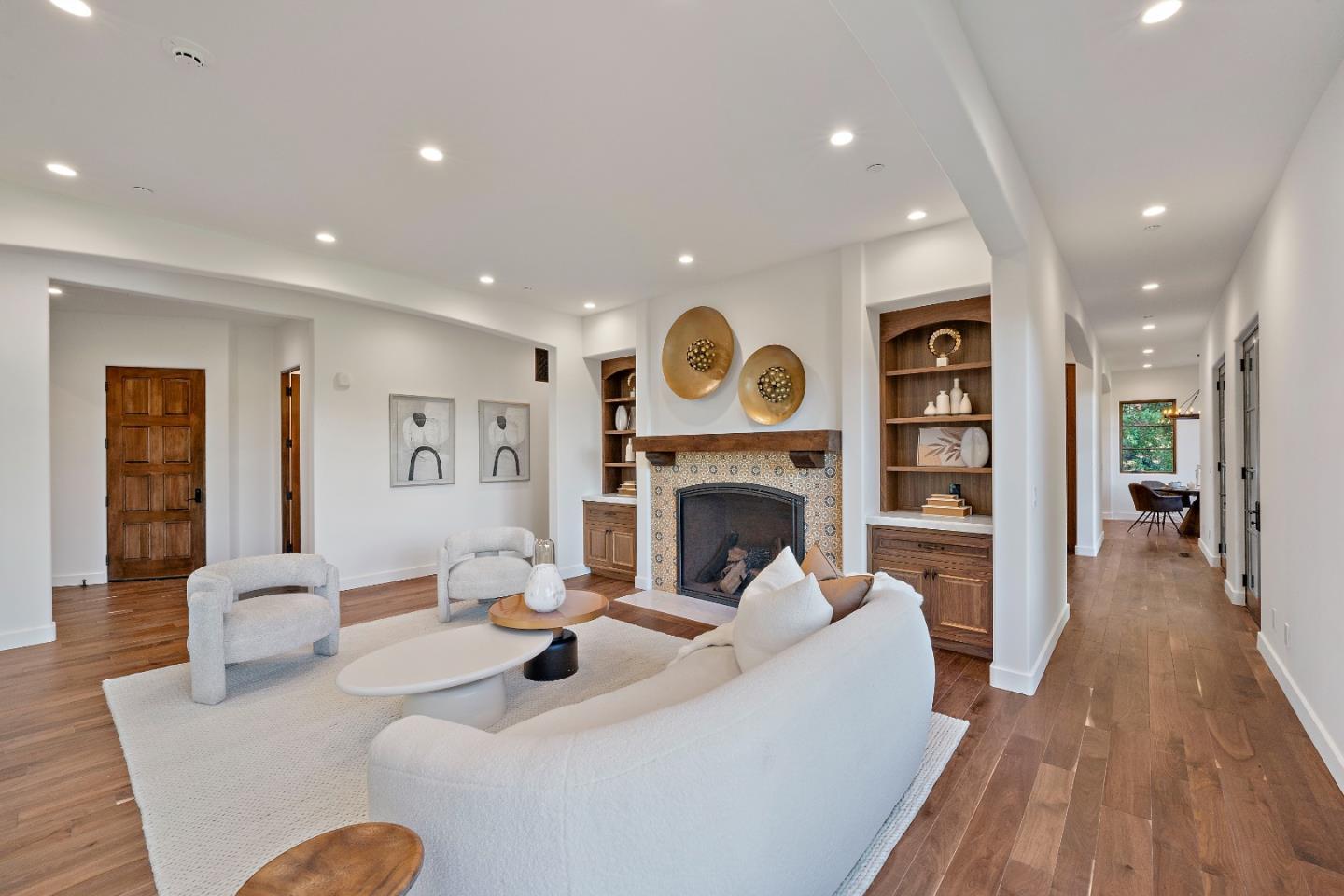 15269 Bohlman Road Saratoga, CA 95070 - Photo 10 of 68 a living room with furniture and a fireplace