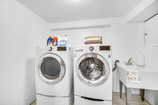 a utility room with dryer and washer
