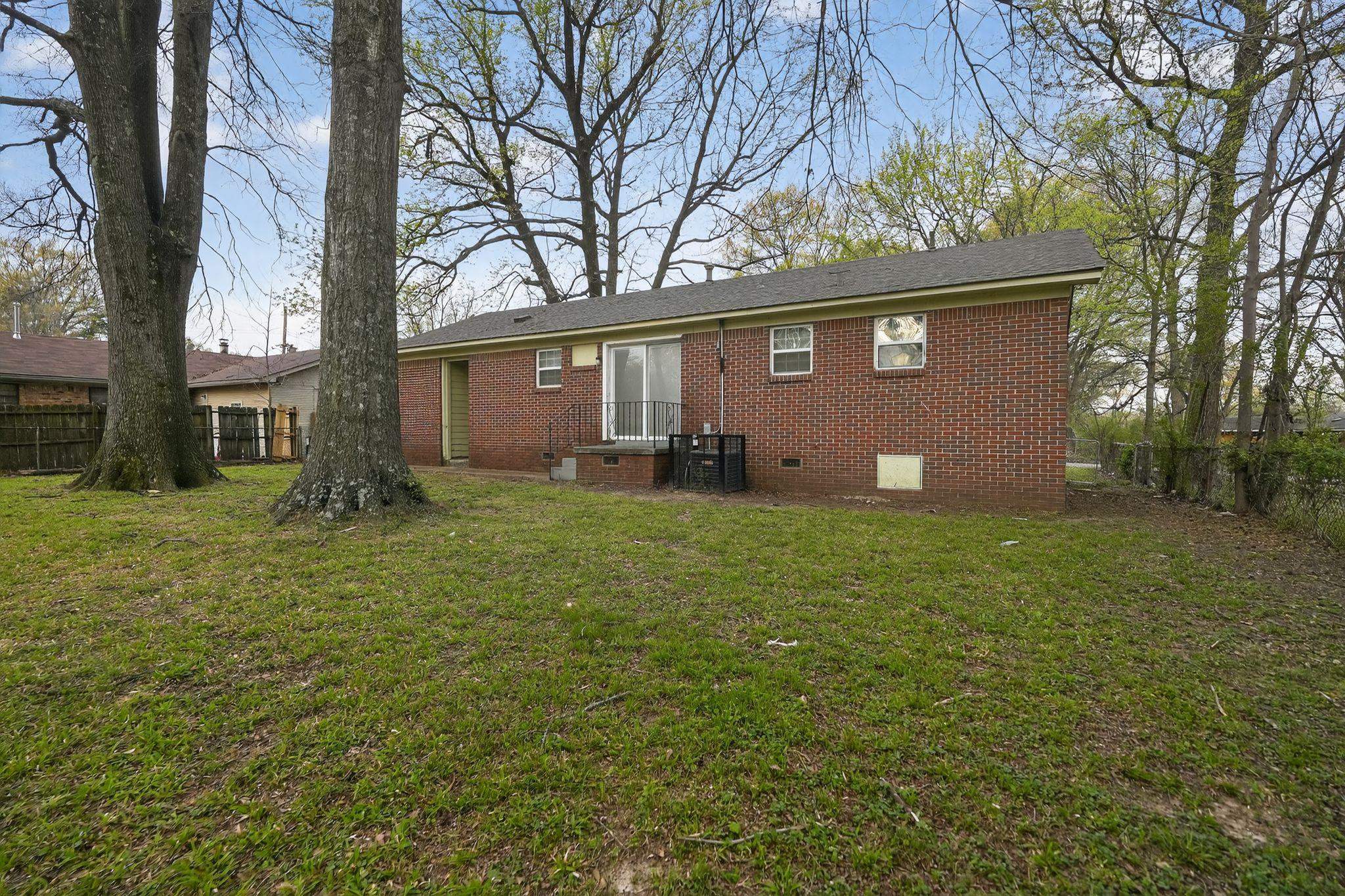 3150 Parham Street Memphis, TN 38127 - Photo 11 of 33 front view of house with a yard