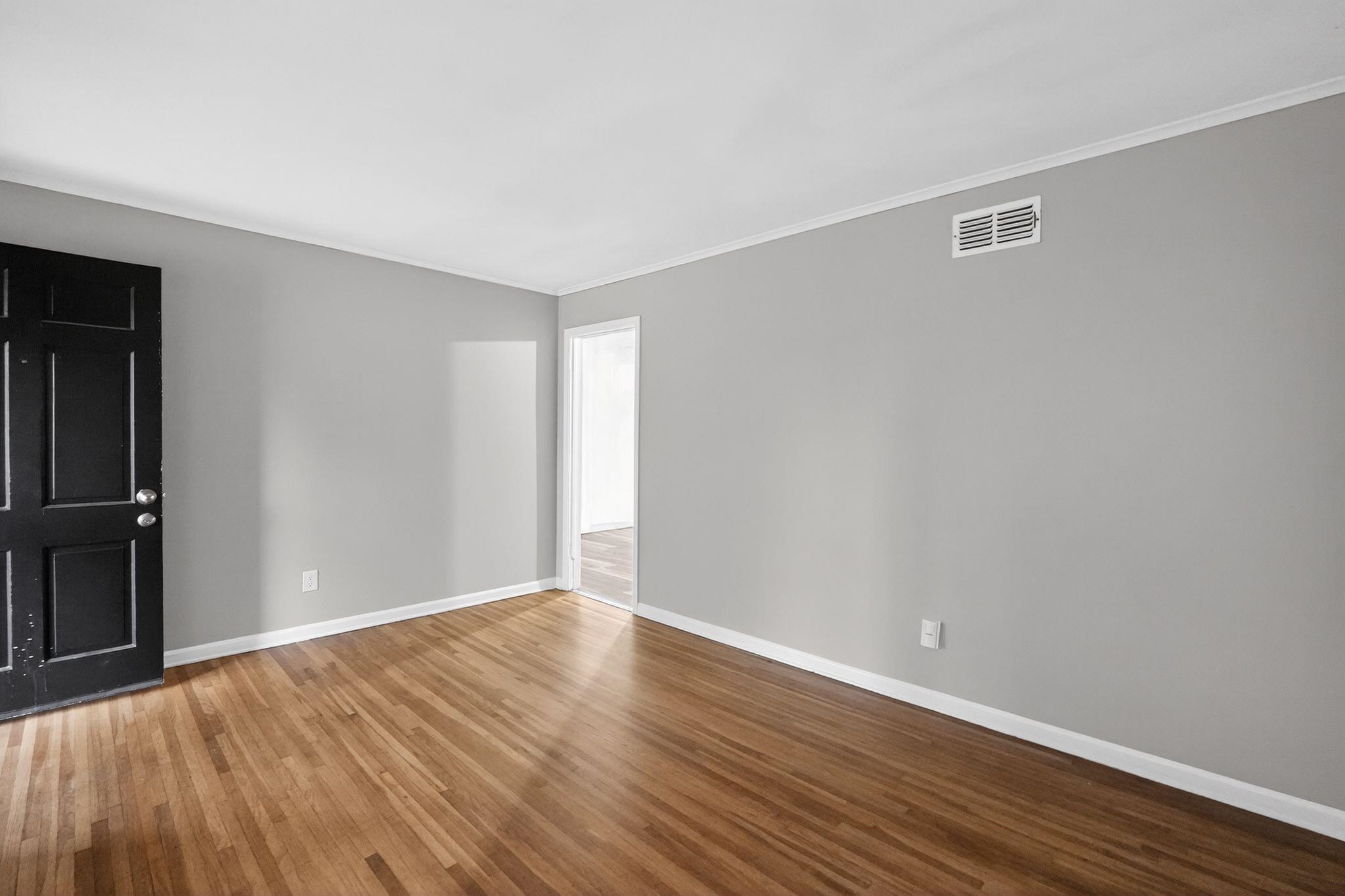 3150 Parham Street Memphis, TN 38127 - Photo 18 of 33 a view of an empty room with wooden floor