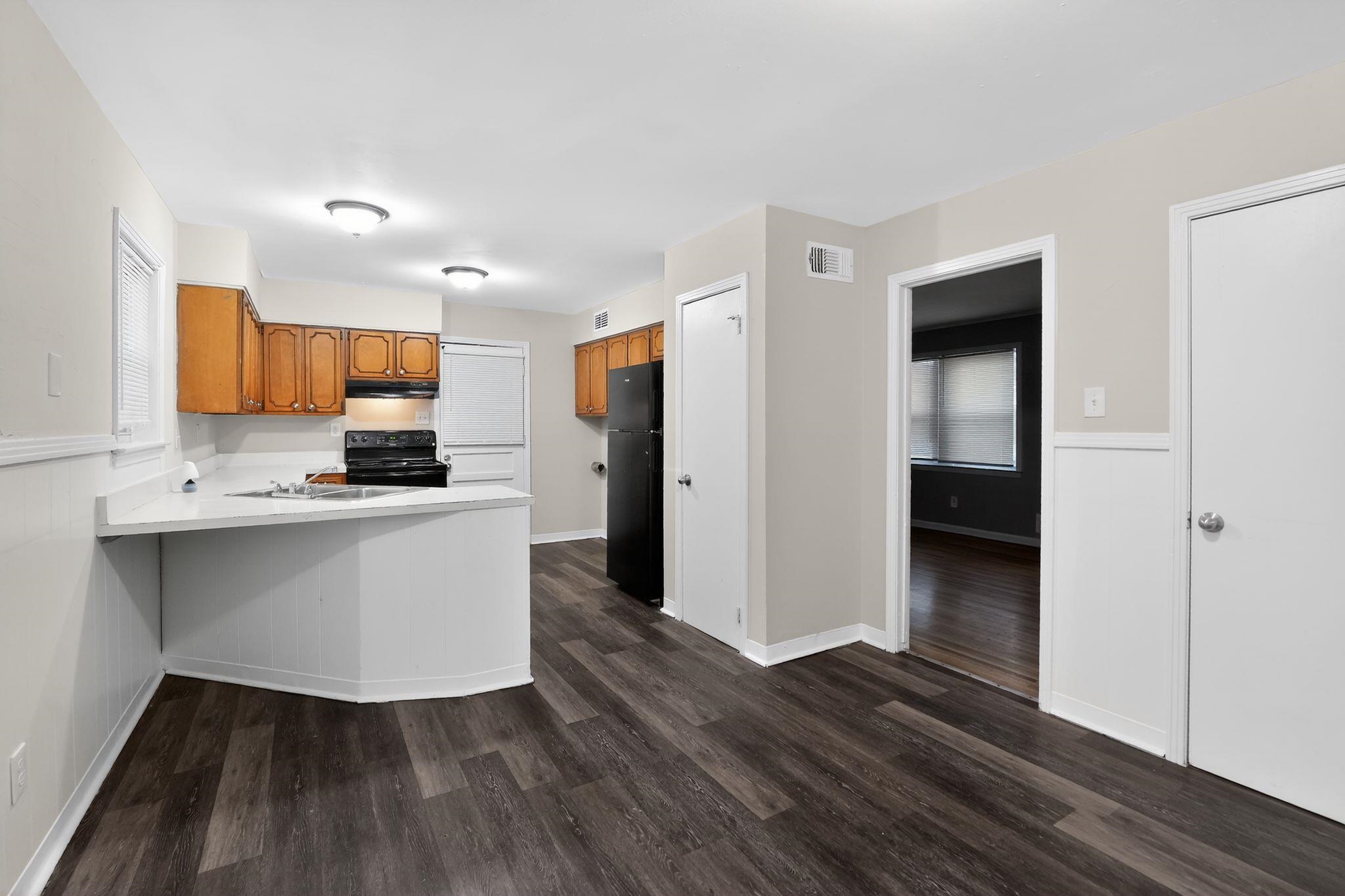 3150 Parham Street Memphis, TN 38127 - Photo 20 of 33 a kitchen with stainless steel appliances a refrigerator and a stove top oven