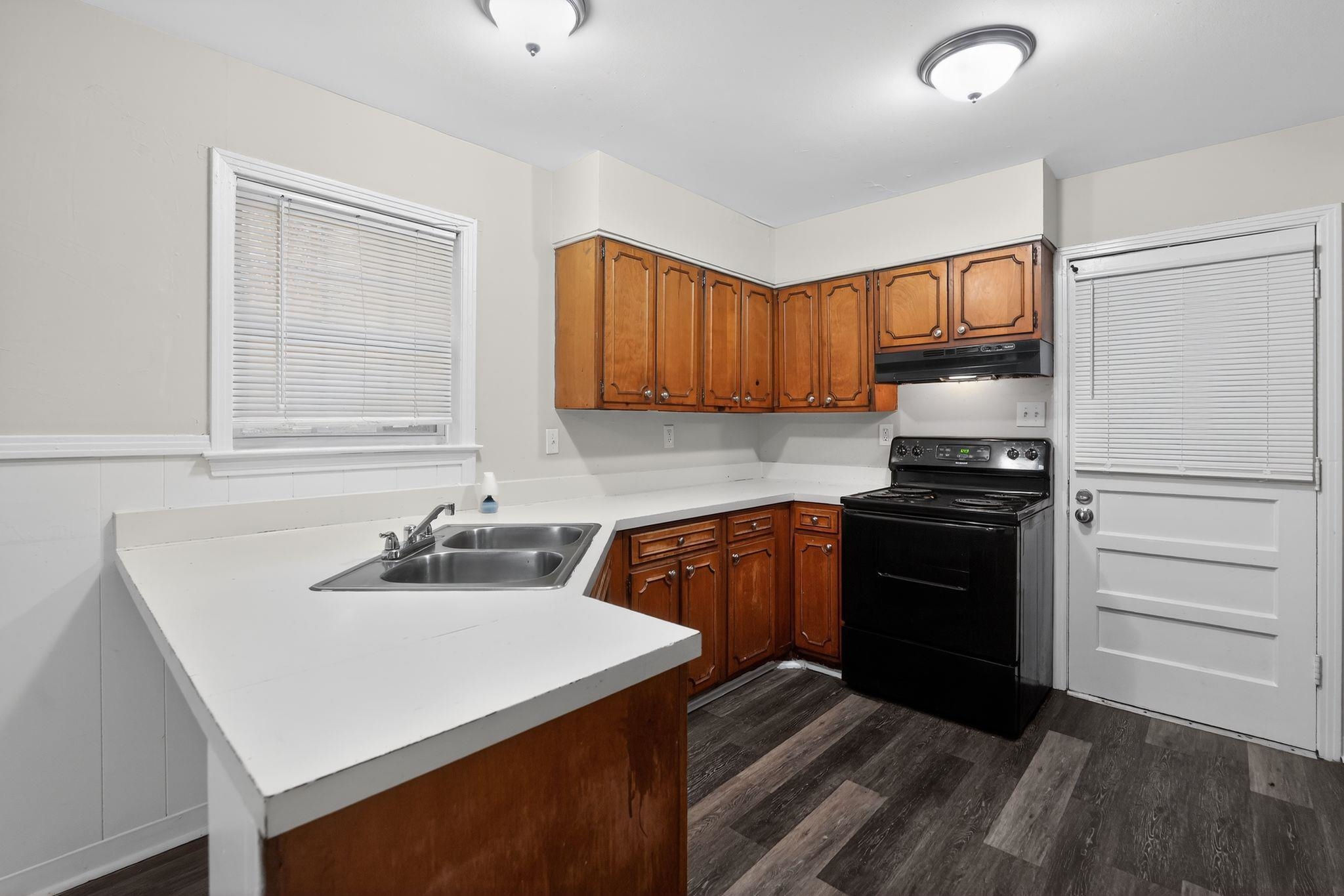 3150 Parham Street Memphis, TN 38127 - Photo 23 of 33 a kitchen with a sink appliances and cabinets
